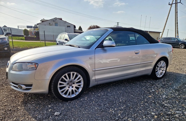 Audi A4 cena 28800 przebieg: 174000, rok produkcji 2006 z Ozimek małe 379